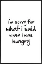 JUNIQE - Poster in kunststof lijst hungry -20x30 /Zwart