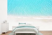 Behang - Fotobehang Blauw - Water - Strand - Breedte 600 cm x hoogte 400 cm