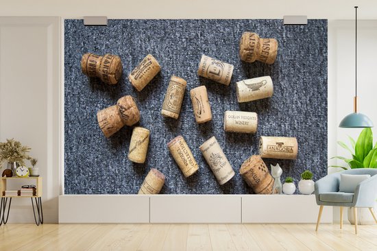 Quelques bouchons sur fond gris fond d' fotobehang