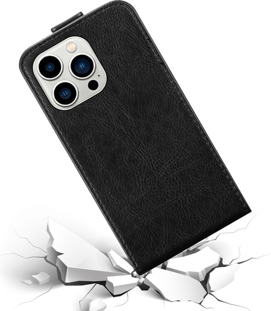 Zwarte flipcase die op een gebarsten witte ondergrond valt.