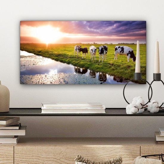 Tableau sur toile Vaches pendant un coucher de soleil - 40x20 cm - Décoration murale Art