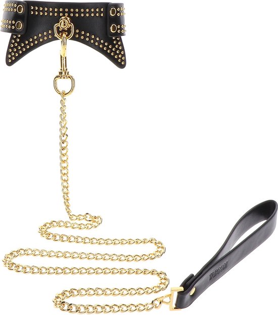 Zwarte taboom kraag met gouden studs en ketting, met handvat.