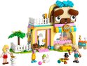 Set LEGO Friends de boutique d'accessoires pour animaux aux couleurs rose, jaune et bleu, toit en forme de tête de chien.