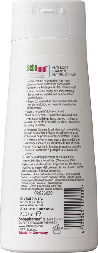 Achterkant van een witte Sebamed Anti-Roos Shampoo fles met ingrediënten en productinformatie in het Nederlands en Frans.