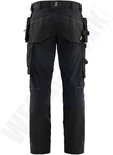 Arrière d'un pantalon de travail noir avec de nombreuses poches et genouillères noires.