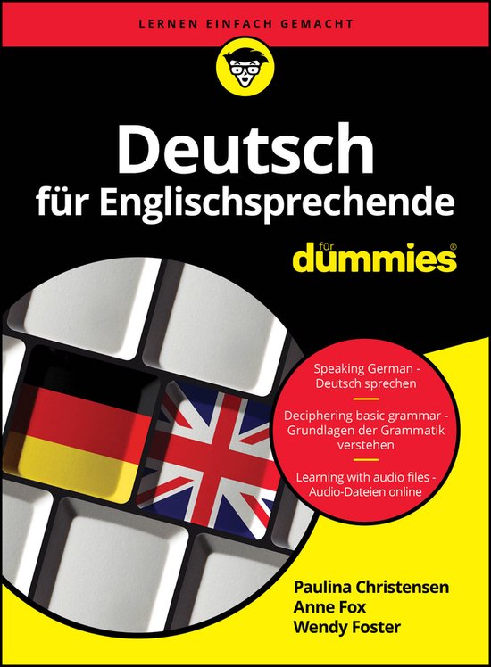 Boek 'Deutsch für Englischsprechende für Dummies' met toetsenbord en vlaggen van Duitsland en het VK.