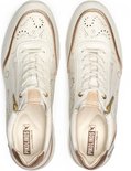 Baskets en cuir crème avec perforations et détails dorés, fermeture éclair et lacets, vue de dessus.