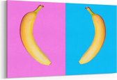 Schilderij - Two bananas facing eatch other — 90x60 cm