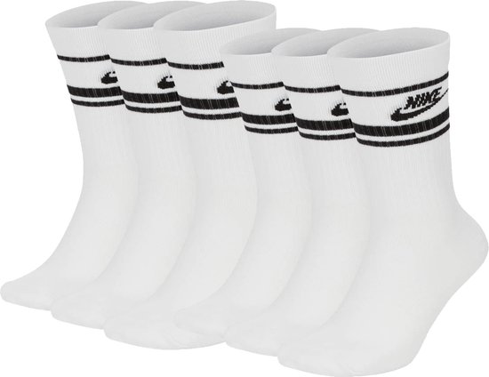 Set van zes witte sokken met twee zwarte strepen en Nike-logo op de schacht.