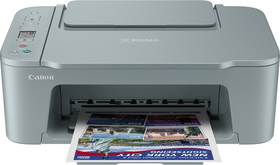 Grijze Canon Pixma printer met een New York City sightseeing brochure eruit.