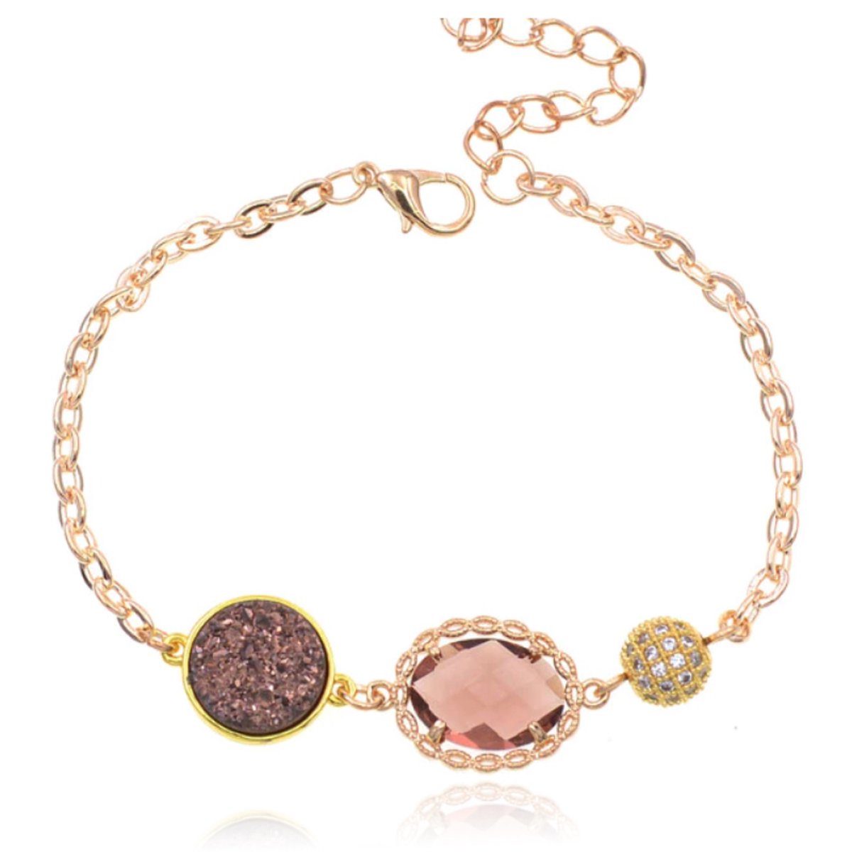 Goudkleurige verstelbare dames armband met roze glassteen