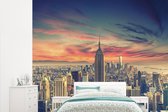 Behang - Fotobehang Kleurrijke lucht boven het Empire State Building in New York - Breedte 315 cm x hoogte 260 cm