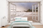 Behang - Fotobehang Doorkijk - Strand - Zee - Breedte 420 cm x hoogte 280 cm