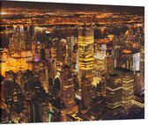 Luchtfoto van nachtelijk Manhattan in New York City - Foto op Canvas - 100 x 75 cm