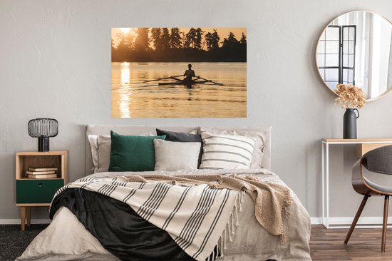 Un homme rame à un coucher de soleil Poster 120x80 cm - Tirage photo sur Poster (décoration murale salon / chambre) / Affiche de Sport