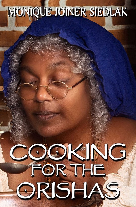Monique Joiner Siedlak met een blauwe hoofddoek, een zilveren lepel in haar hand en de tekst "COOKING FOR THE ORISHAS".