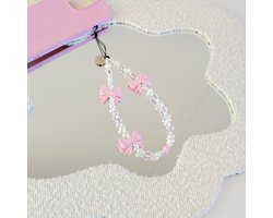 xoxo Wildhearts koord - Girl Code - Phone Charm (small) - bedeltje geschikt voor iPhone - Parelketting / Kralenketting met strikjes - kort telefoonkoord geschikt voor Samsung - geschikt voor alle telefoonmodellen - Wit / Roze