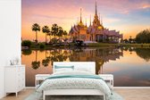 Behang - Fotobehang Thailand - Tempel - Oranje - Breedte 450 cm x hoogte 300 cm