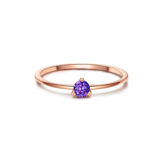 Fine bague dorée avec une zircone violette en forme de poire