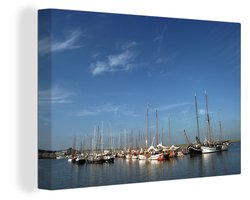 Canvas Schilderij Een haven bij Ameland - 90x60 cm - Wanddecoratie