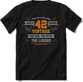 42 Jaar Legend T-Shirt | Goud - Zilver | Grappig Verjaardag Cadeau | Dames - Heren | - Zwart - XXL