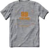 99 Jaar Legend T-Shirt | Goud - Zilver | Grappig Verjaardag Cadeau | Dames - Heren | - Donker Grijs - Gemaleerd - M