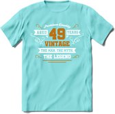 49 Jaar Legend T-Shirt | Goud - Wit | Grappig Verjaardag en Feest Cadeau Shirt | Dames - Heren - Unisex | Tshirt Kleding Kado | - Licht Blauw - L
