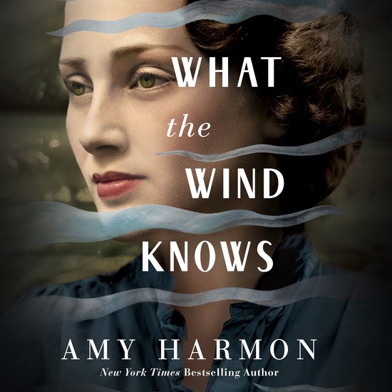 Boekcover met een vrouw, titel 'What the Wind Knows' door Amy Harmon