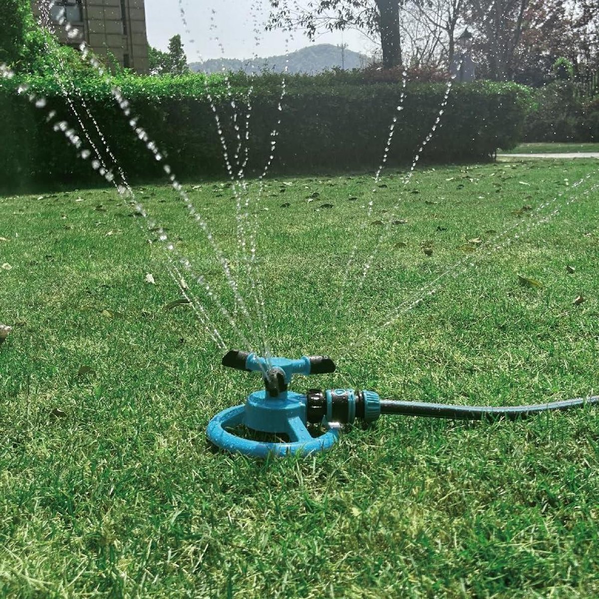 Gazonsproeier Roterend - Tuinsproeier - Gras en planten water geven - 360 graden dekking - 15x15x10 cm - Groen
