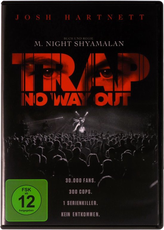 DVD-hoes met de titel 'TRAP NO WAY OUT'. Twee ogen kijken neer op een publiek en een artiest op een podium.