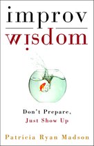Boek 'Improv Wisdom' met een goudvis die uit een kom springt.