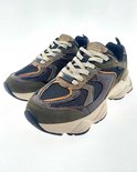 Paar groene Mexx Norah Komo sneakers met slangenprint, beige veters en crèmekleurige zolen.