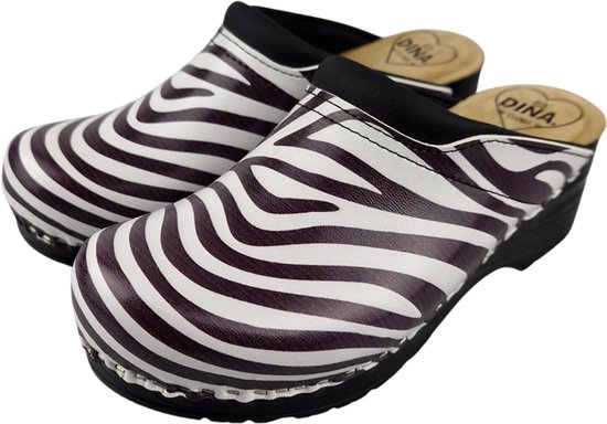 Klompen met zebraprint in wit en donkerpaars. Zwarte rand en details.