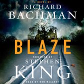 Boekomslag van Blaze, een roman van Richard Bachman, met een spookachtig huis op een besneeuwde oprit.
