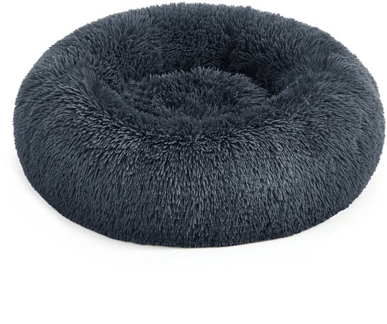 Rond, donkergrijs, pluizig hondenbed met hoge randen.