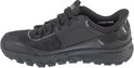 Zwarte Skechers heren sneaker, zijaanzicht. De sneaker heeft een 'Hands Free Slip-Ins' logo.
