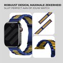 Close-up van een Apple Watch met een blauw en goudkleurig metalen bandje. Ook losse banden zichtbaar.