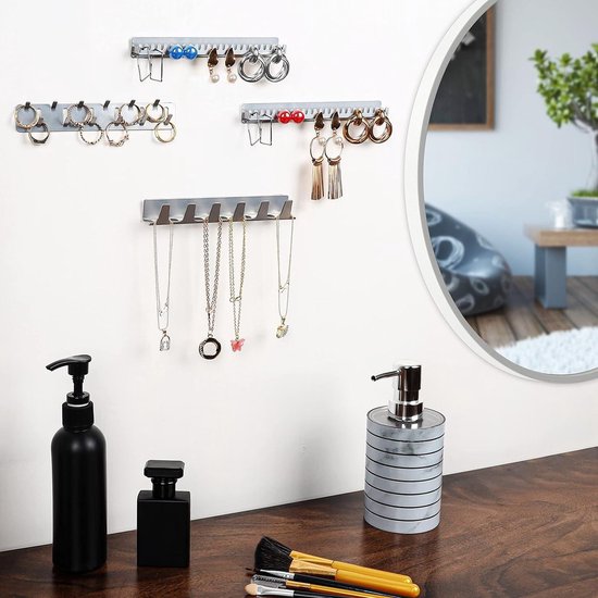 Waar dienen de metalen lipjes op ronde stopcontacten voor