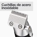 Zilveren metalen tondeuse mes met ruitpatroon en zwarte tandjes. Tekst: Cuchillas de acero inoxidable.