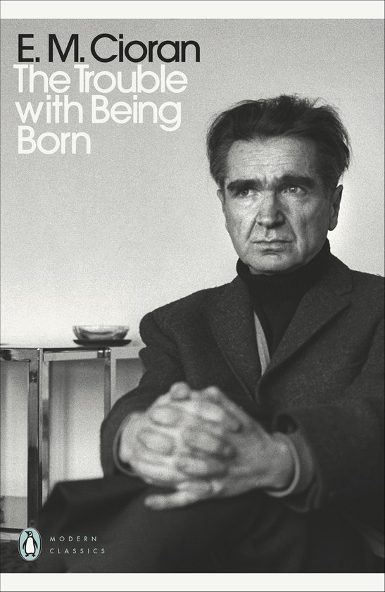 Couverture du livre 'The Trouble With Being Born' avec une photo en noir et blanc d'E.M. Cioran, au regard sévère.