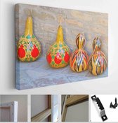 Interesting pumpkins painted with oriental ornament against brick wall - Modern Art Canvas - Horizontal - 1097343131 - 115*75 Horizontal