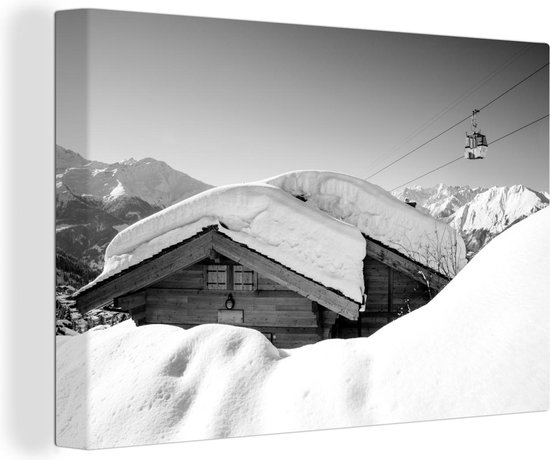 Canvas Schilderij Sneeuw op een hut in Zwitserland - zwart wit - 90x60 cm - Wanddecoratie