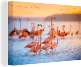 Canvas schilderij 180x120 cm - Wanddecoratie Flamingo - Zee - Zon - Zomer - Muurdecoratie woonkamer - Slaapkamer decoratie - Kamer accessoires - Schilderijen