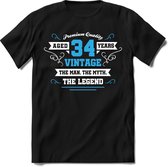 34 Jaar Legend - Feest kado T-Shirt Heren / Dames - Wit / Blauw - Perfect Verjaardag Cadeau Shirt - grappige Spreuken, Zinnen en Teksten. Maat 3XL
