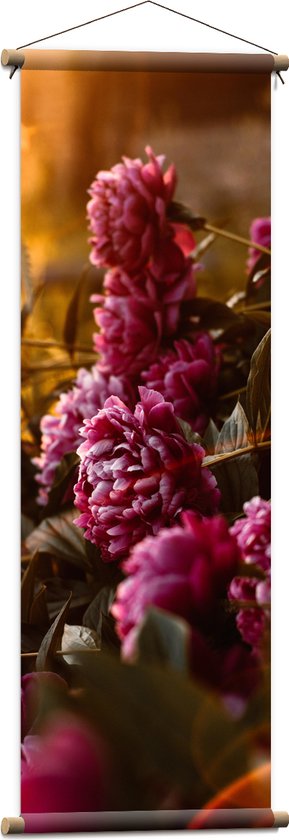 Textielposter - Felle Roze bloemen met Planten - 40x120 cm Foto op Textiel