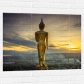 Muursticker - Gouden Buddha op Standaard met Uitzicht op Landschap - 100x75 cm Foto op Muursticker