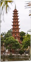 WallClassics - Tuinposter – De Oudste Boeddhistische Tempel - Vietnam - 50x100 cm Foto op Tuinposter (wanddecoratie voor buiten en binnen)