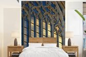 Behang - Fotobehang Een gotisch venster - Breedte 190 cm x hoogte 260 cm