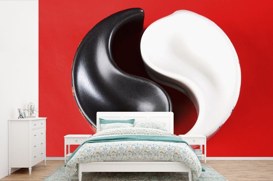 Cendrier Yin et Yang devant un fond d' fotobehang rouge