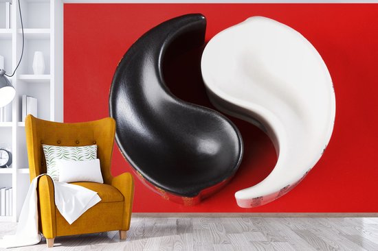 Cendrier Yin et Yang devant un fond d' fotobehang rouge